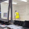 HPH decorator redecorating an operational office inside Aldi Darlington Distribution Centre