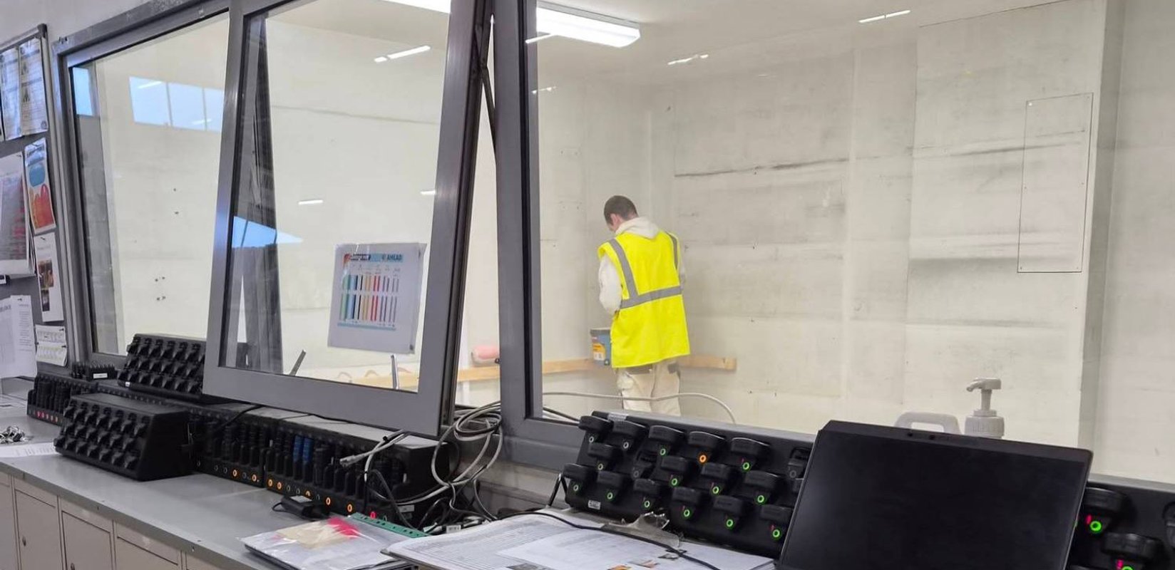 HPH decorator redecorating an operational office inside Aldi Darlington Distribution Centre