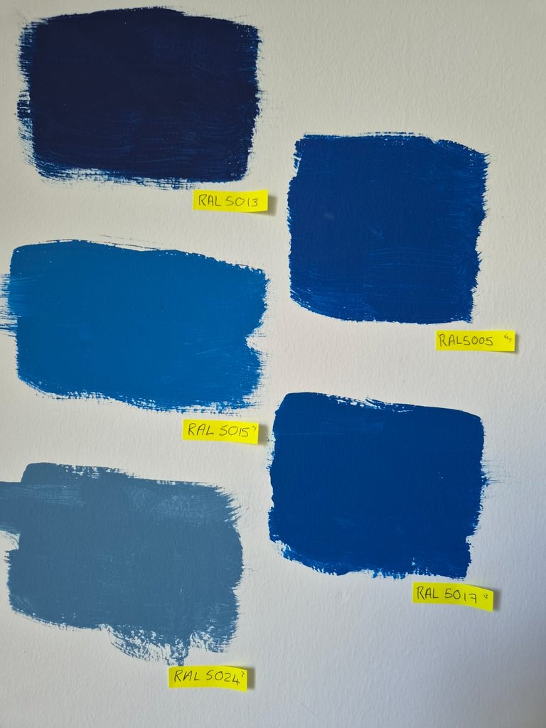 Five blue RAL paint colour samples tested for the Bertling office scheme
