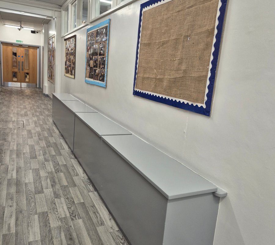 Freshly painted school corridor and fitted storage