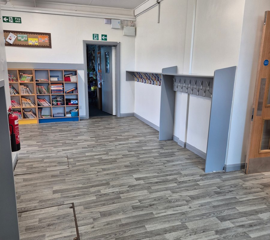 Decorated school cloakroom with grey and white finishes