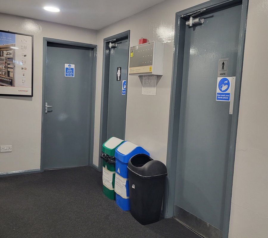 Commercial doors and walls finished in contrasting greys