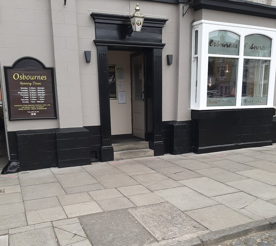 Commercial venue exterior finished in grey, black and white