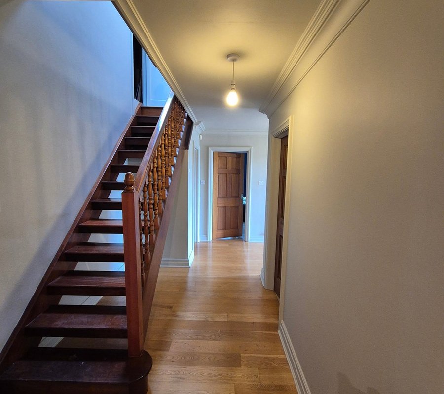 Freshly decorated neutral hallway and staircase