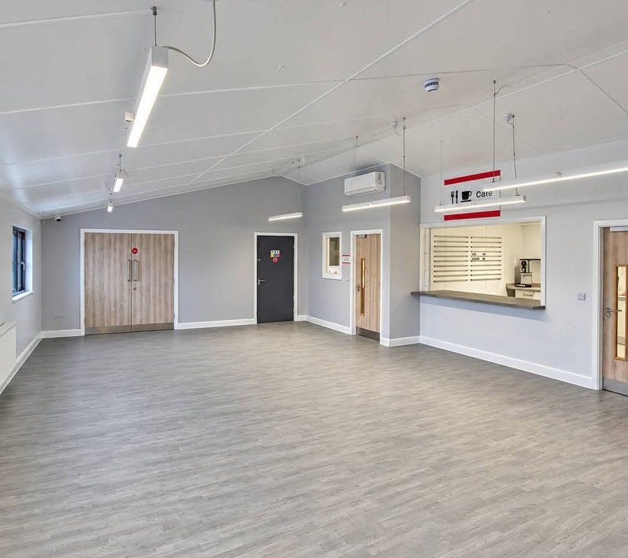 Decorated main hall at Middlesbrough FC Foundation East Cleveland with grey walls and white ceiling